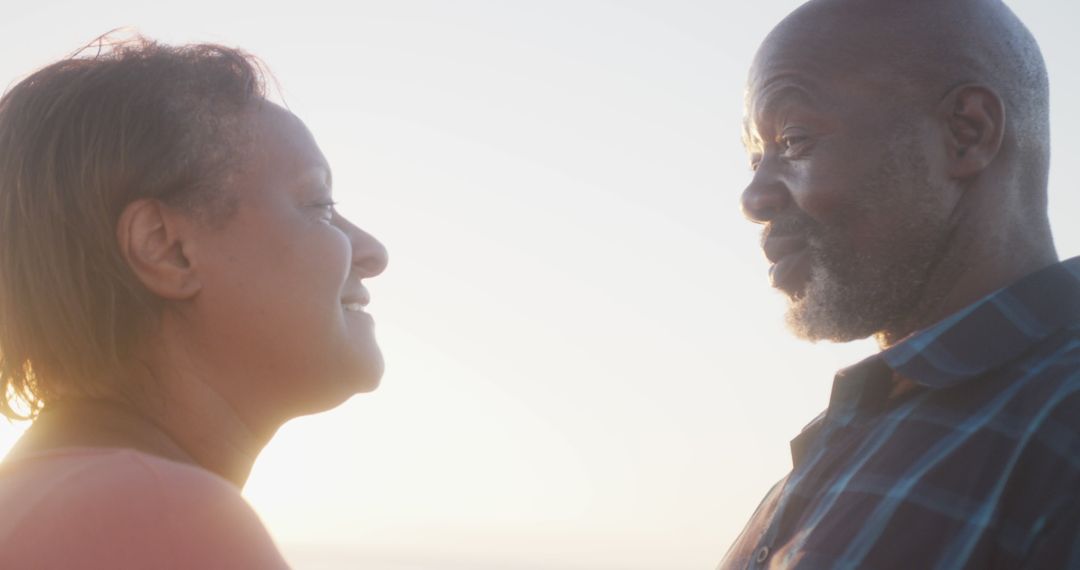Senior Couple Enjoying Moment on Sunny Beach