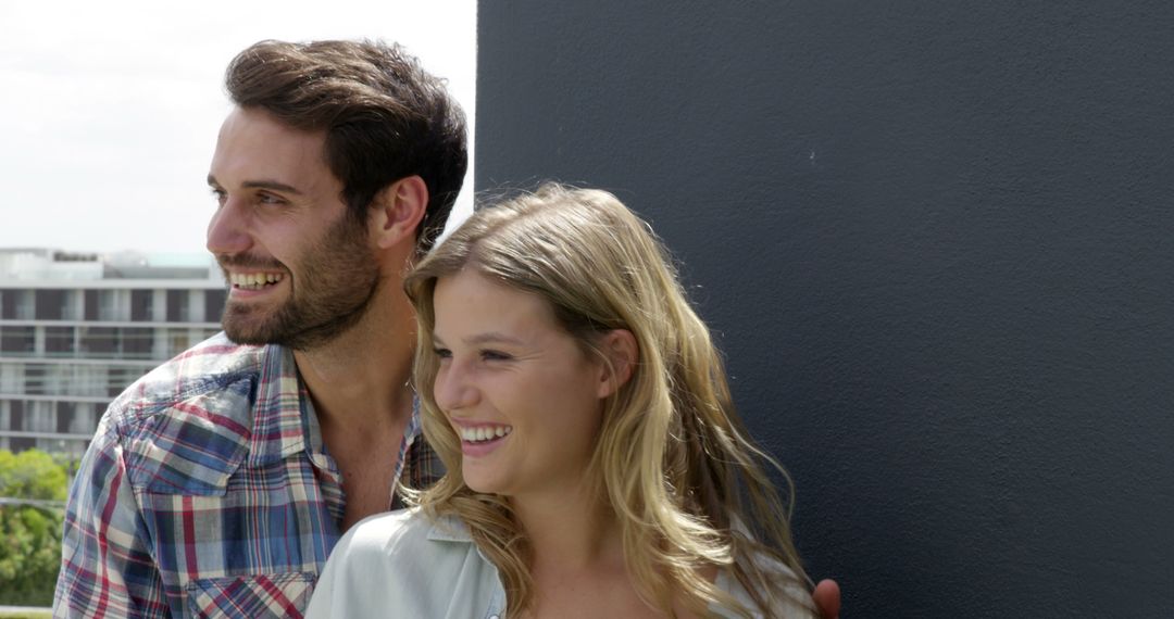 Smiling Young Couple Enjoying Time Outdoors Together - Free Images, Stock Photos and Pictures on Pikwizard.com