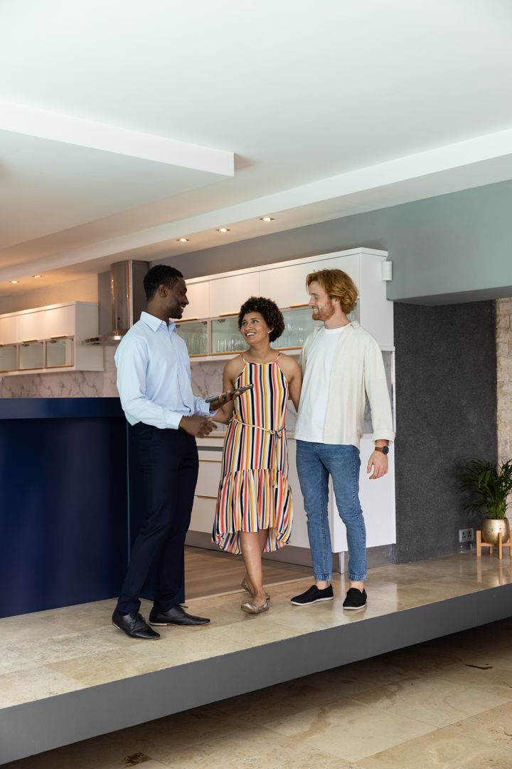 Professionals Discuss Modern Kitchen Design with Clients