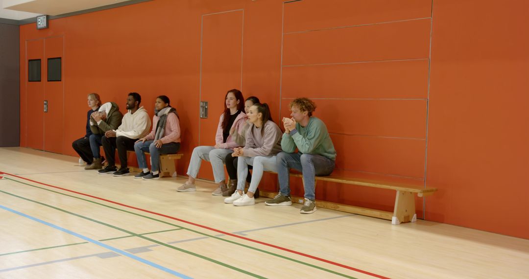 Diverse Group of Friends Enjoying a Game in the Gym