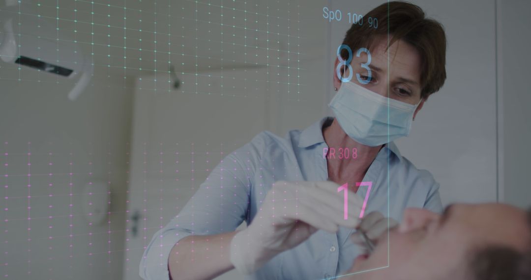 Female Dentist Using Heart Rate Monitor Examining Patient's Teeth