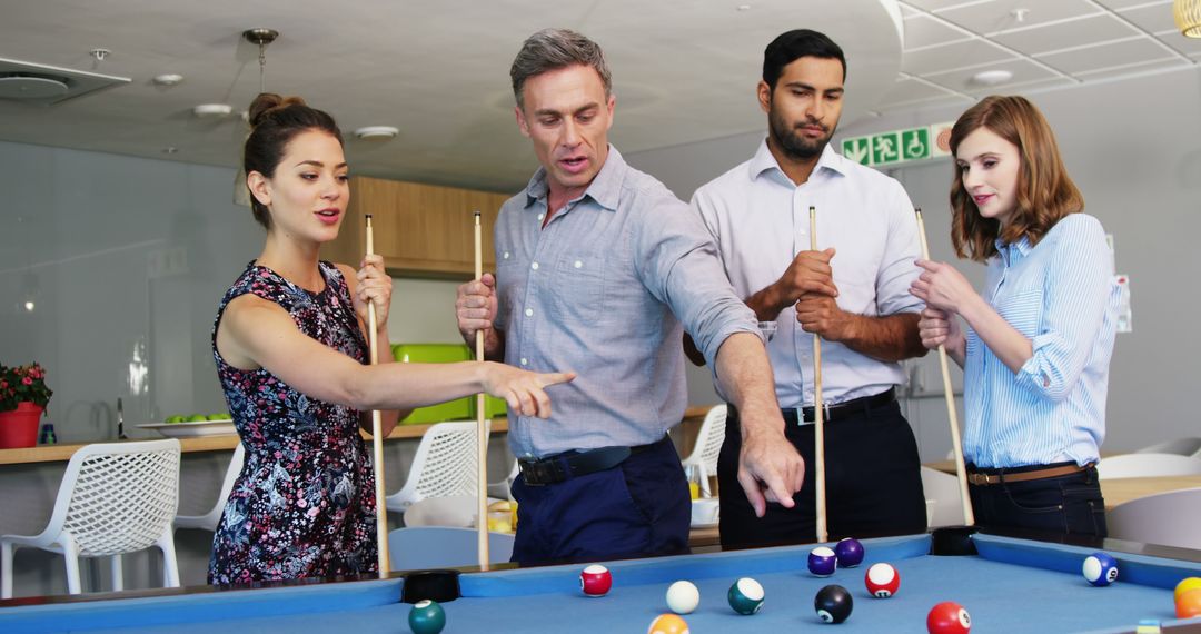 Group of Colleagues Enjoying a Pool Game During Office Break - Free Images, Stock Photos and Pictures on Pikwizard.com