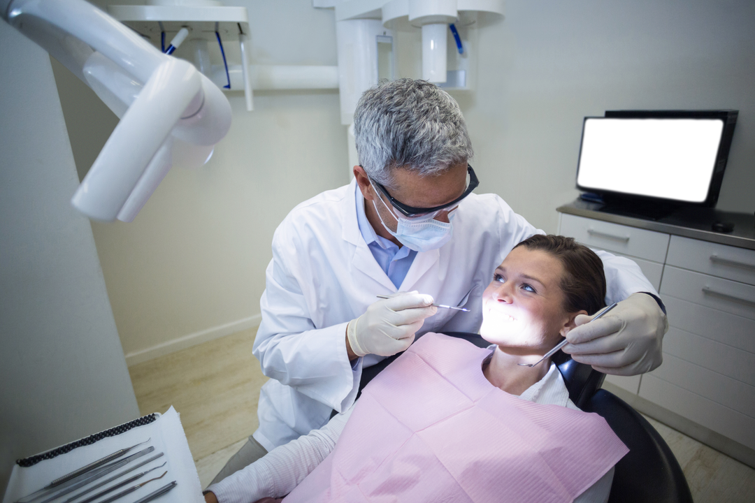 Transparent Dentist Performing Examination on Relaxed Patient in Clinic - Download Free Stock Images Pikwizard.com