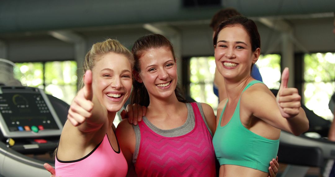 Happy Women Exercising and Giving Thumbs Up in Gym - Free Images, Stock Photos and Pictures on Pikwizard.com