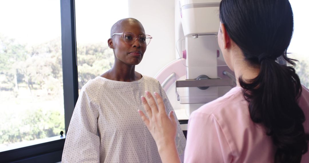 Receiving mammogram while technician guiding positioning with augmented reality overlay
