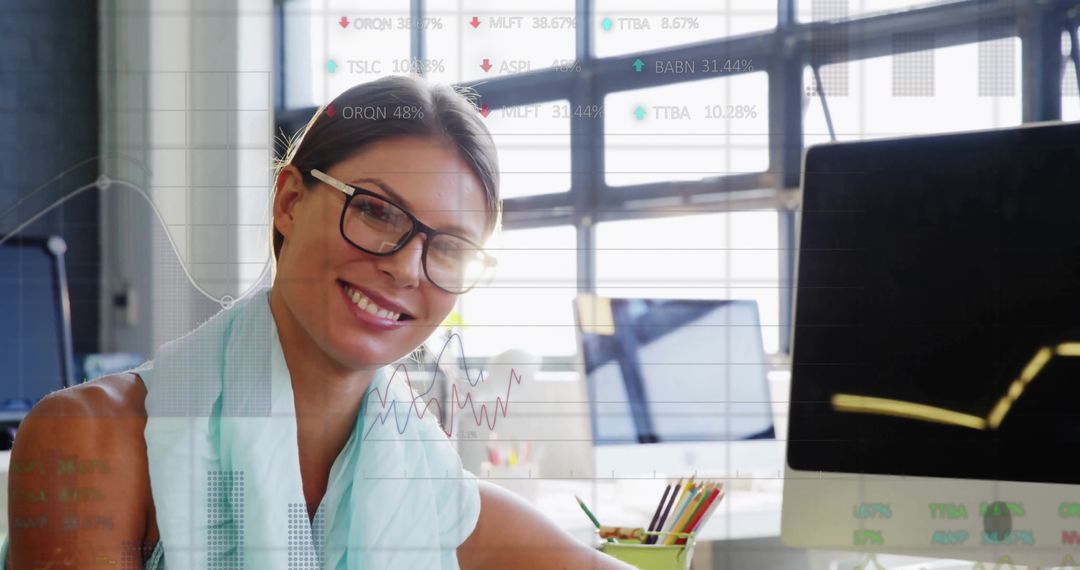 Confident Businesswoman Reviewing Financial Analytics in Modern Office