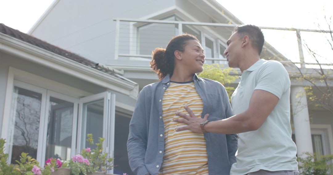 Happy LGBTQ Couple Standing in Front of Modern Home - Free Images, Stock Photos and Pictures on Pikwizard.com