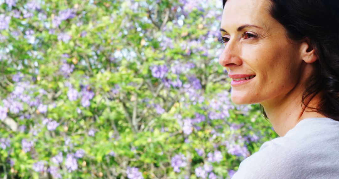 Smiling Woman Outdoors in Nature - Free Images, Stock Photos and Pictures on Pikwizard.com