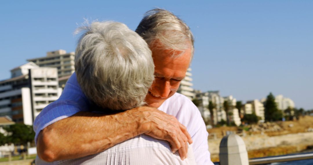 Emotionally Warm Embrace of Senior Friends Outdoors - Free Images, Stock Photos and Pictures on Pikwizard.com