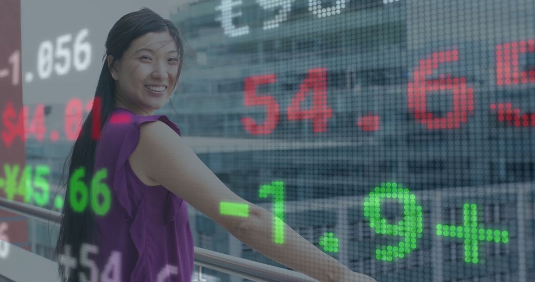 Smiling Asian Businesswoman Overseeing Financial Data on Balcony