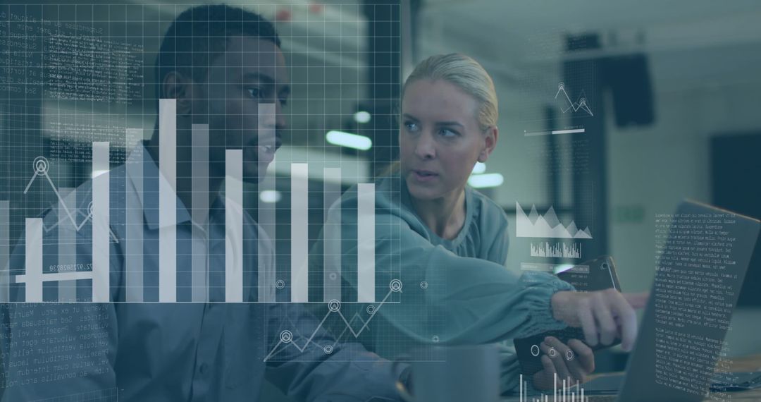 Business Team Analyzing Digital Data on Laptop in Modern Office