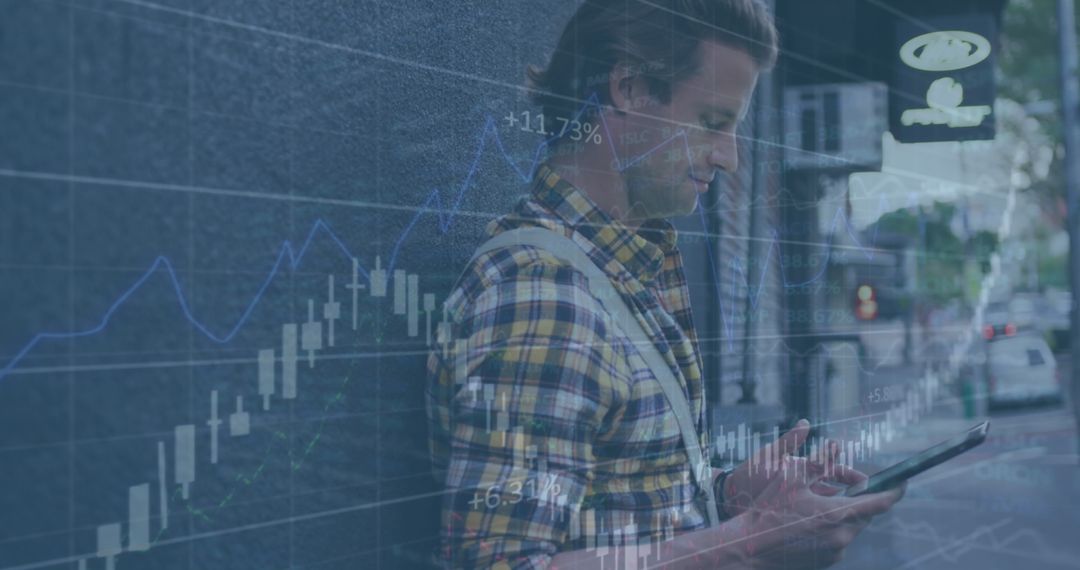 Man Analyzing Business Data on Tablet with Financial Graph Overlay