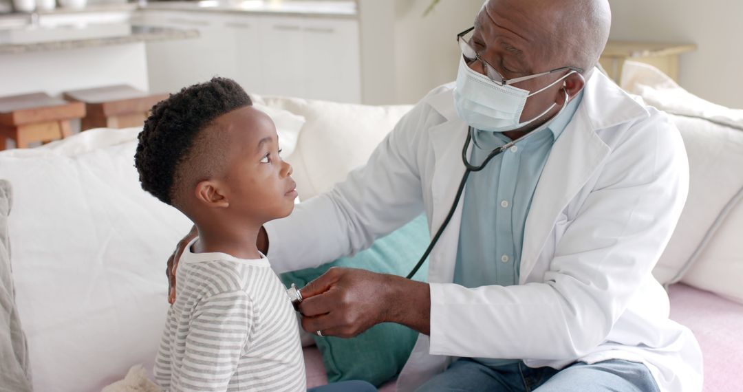 Doctor Examining Child with Stethoscope on Couch - Free Images, Stock Photos and Pictures on Pikwizard.com