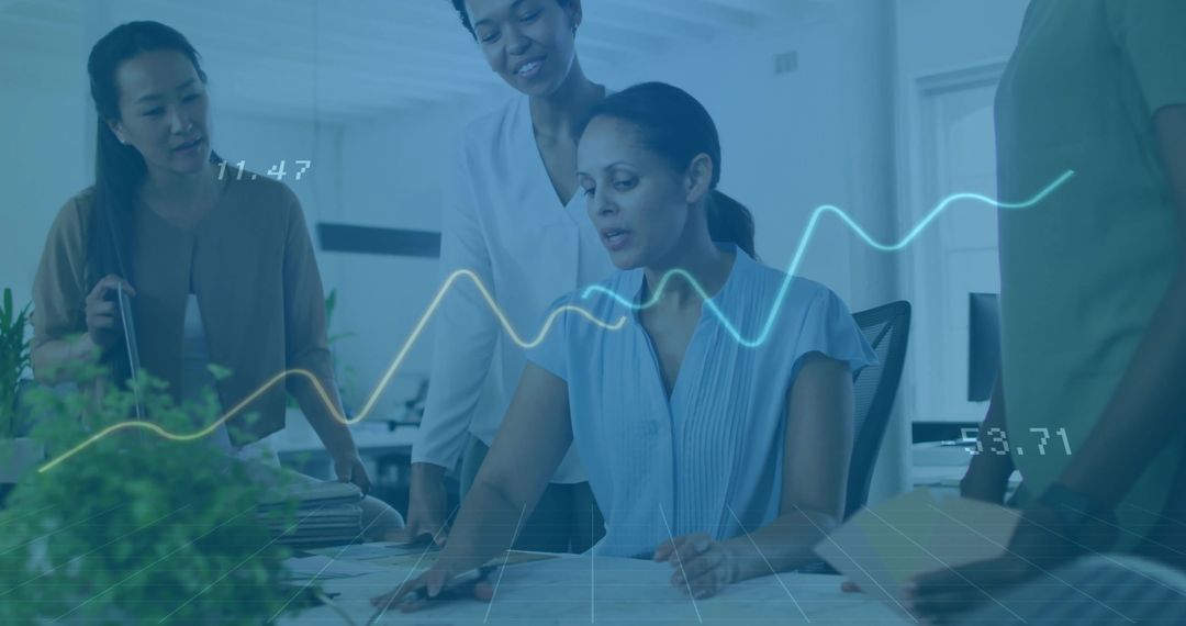 Diverse Team Engaging in Data Analysis at Modern Office