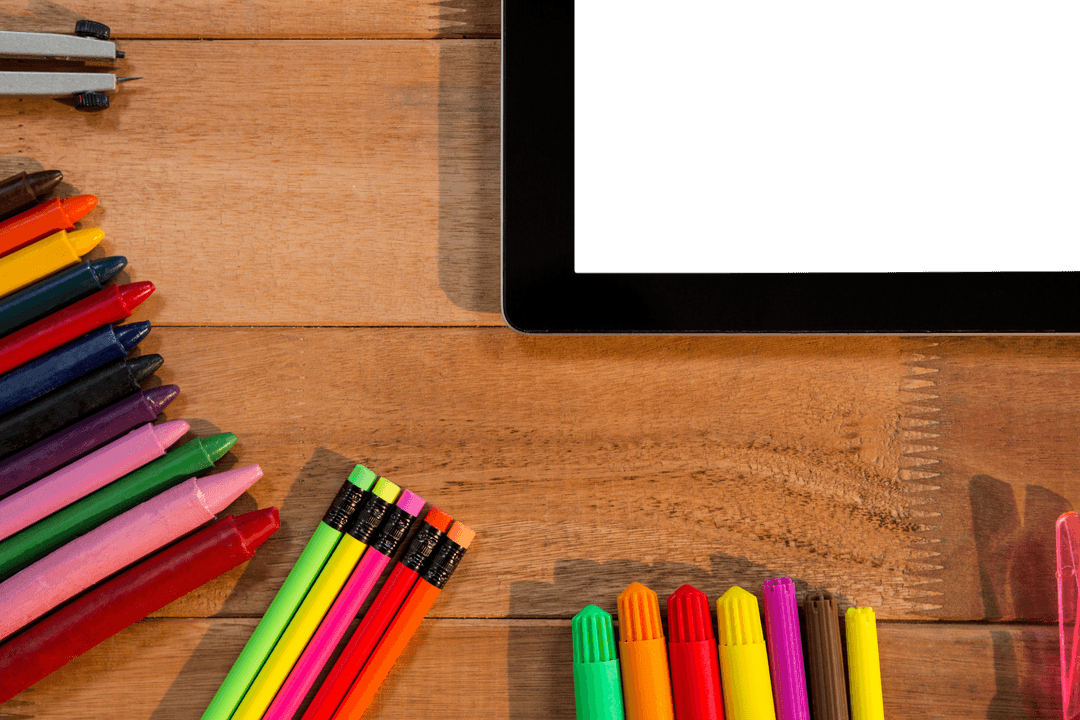 Transparent Tablet and Colorful Stationery on Wooden Surface