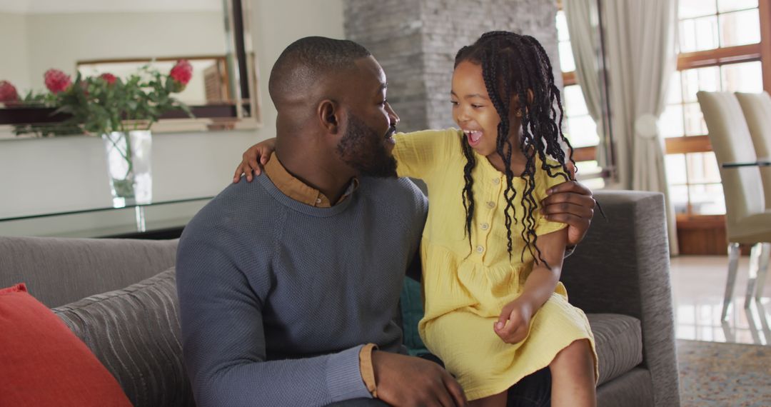 Joyful Father and Daughter Bonding Indoors