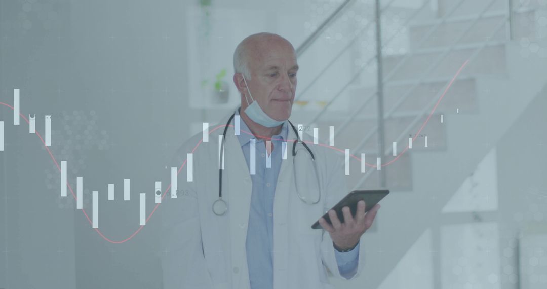 Senior Doctor Analyzing Data with Tablet in Hospital Environment