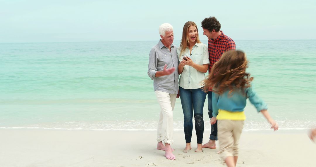 Happy Multi-Generational Family Enjoying Beach Time Together - Free Images, Stock Photos and Pictures on Pikwizard.com