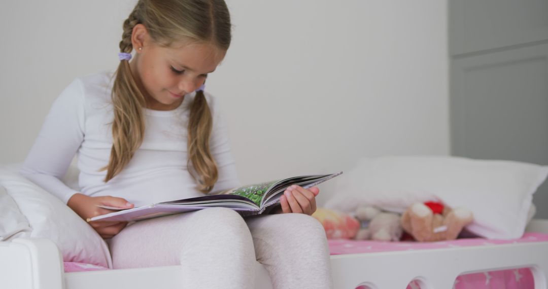 Young Girl Reading Book in Cozy Bedroom - Free Images, Stock Photos and Pictures on Pikwizard.com