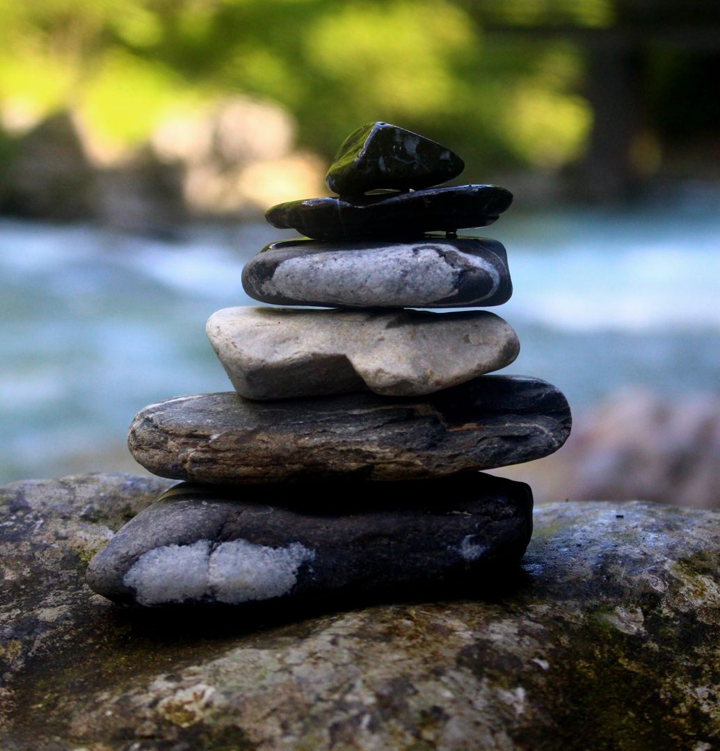 Balanced Stack of Rocks in Tranquil Nature Setting - Free Images, Stock Photos and Pictures on Pikwizard.com