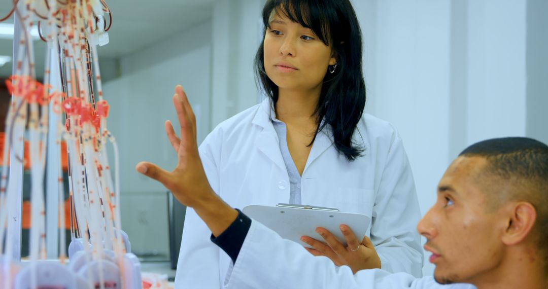 Medical Researchers Analyzing Blood Samples in Laboratory - Free Images, Stock Photos and Pictures on Pikwizard.com