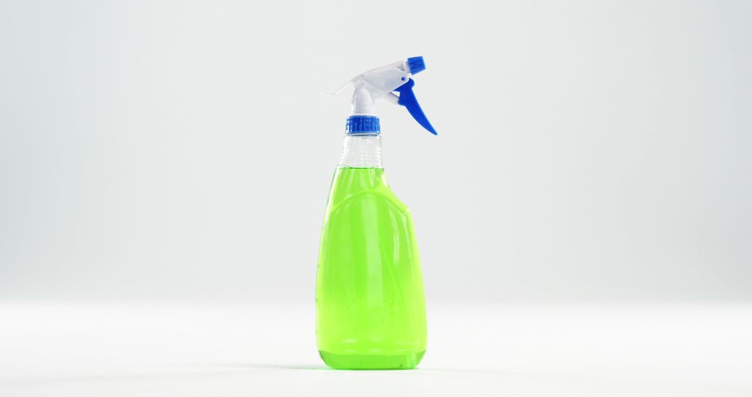 Green Liquid in Spray Bottle on White Background - Free Images, Stock Photos and Pictures on Pikwizard.com