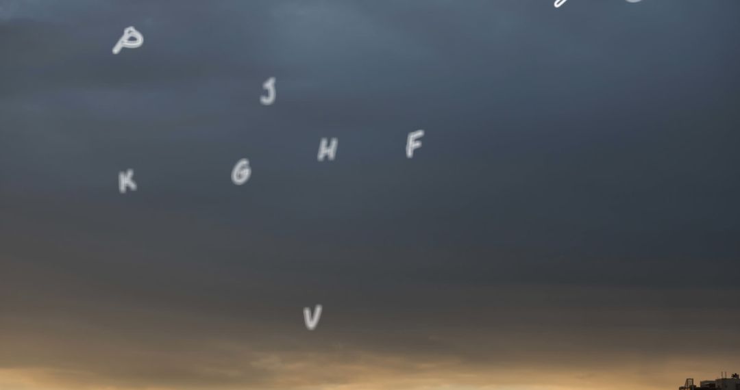 Letters Forming in the Evening Sky with Dark Clouds - Free Images, Stock Photos and Pictures on Pikwizard.com