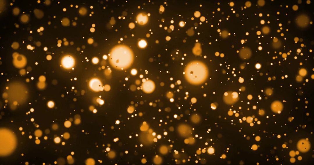 Glowing Orange Particles on Dark Background