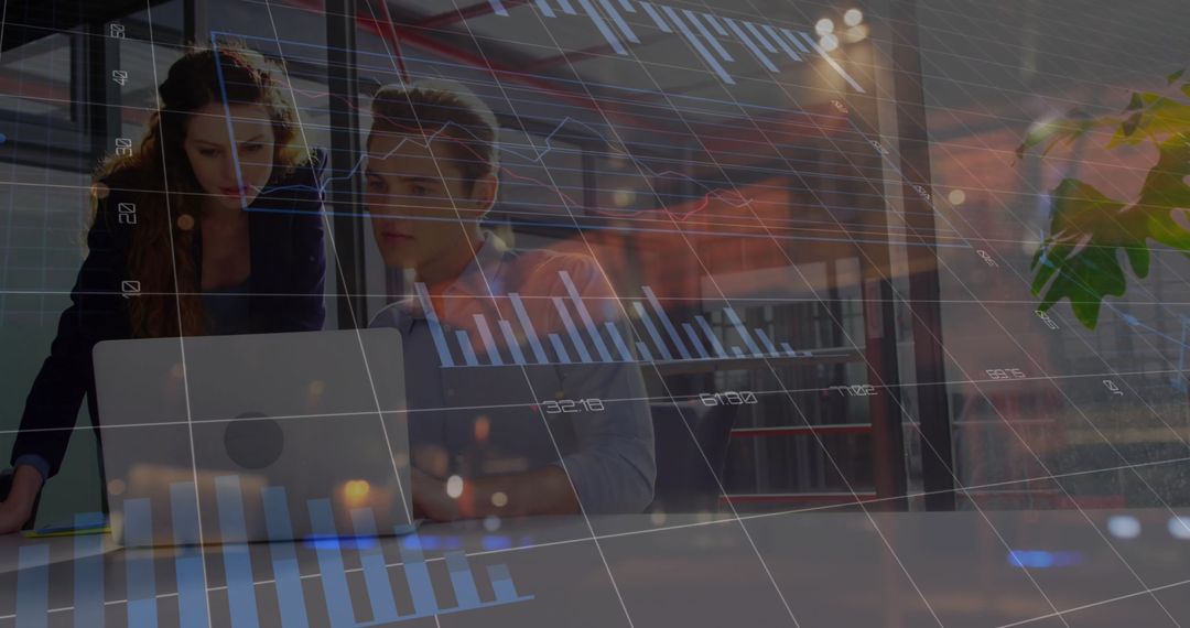 Team Analyzing Financial Data on Laptop with Graphs Overlaid
