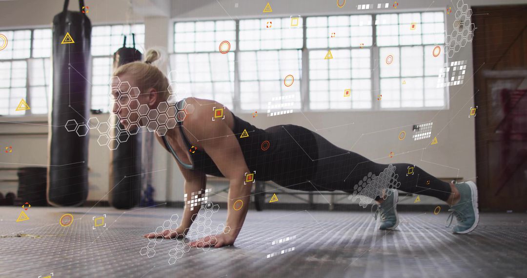 Female Athlete With Virtual Tech Overlays Doing Plank in Gym