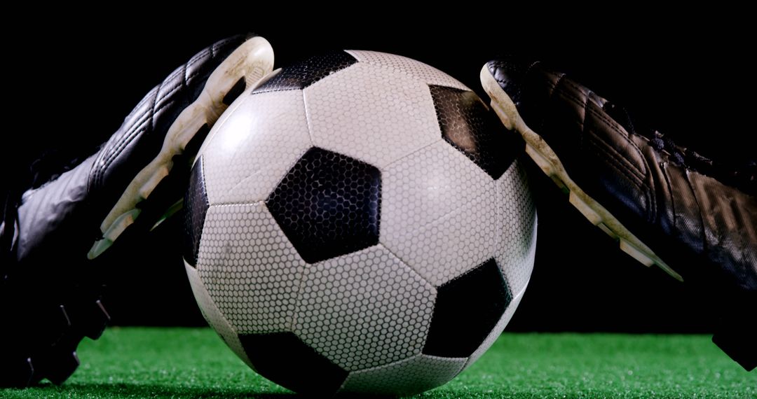 Close-up of Soccer Ball Between Players' Feet on Turf Field - Free Images, Stock Photos and Pictures on Pikwizard.com