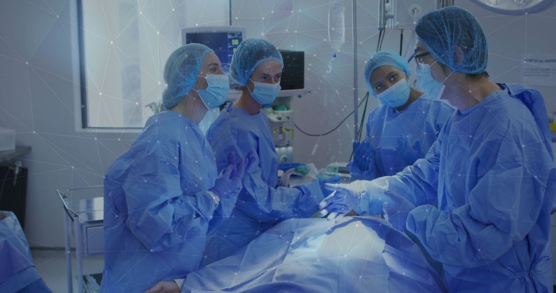 Surgical Team Performing Focused Surgery in Operating Theater