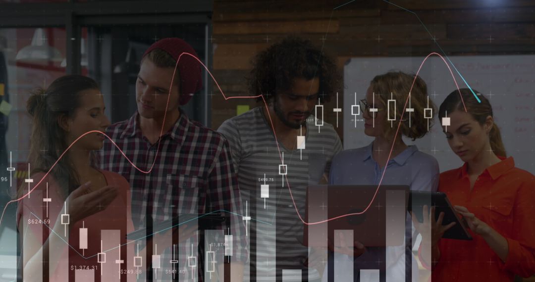 Diverse Team Analyzing Financial Data on Laptops