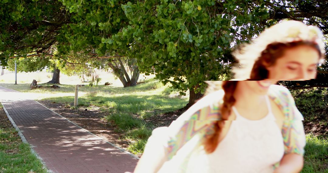 Motion Blur of Happy Woman Running in Park with Braided Hair - Free Images, Stock Photos and Pictures on Pikwizard.com