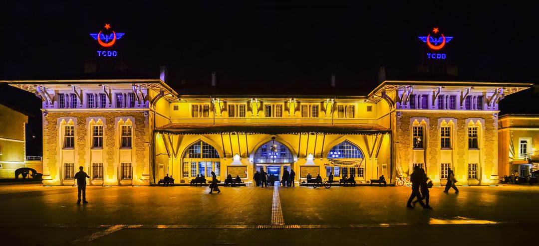 Illuminated Historic Train Station at Night - Free Images, Stock Photos and Pictures on Pikwizard.com