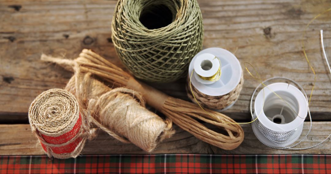 Assorted Rustic Twine and Ribbon on Wooden Surface - Free Images, Stock Photos and Pictures on Pikwizard.com