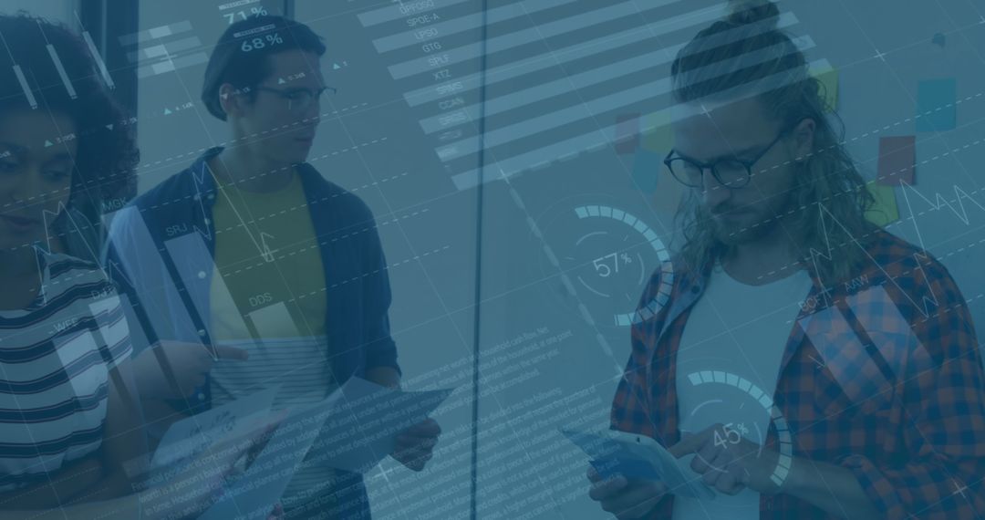 Diverse Team Analyzing Business Data and Statistics at Office