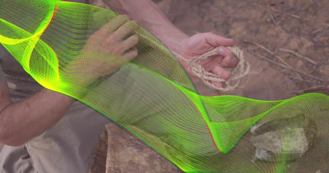 Hands Handling Rope With Digital Green Matrix Overlay Outdoors