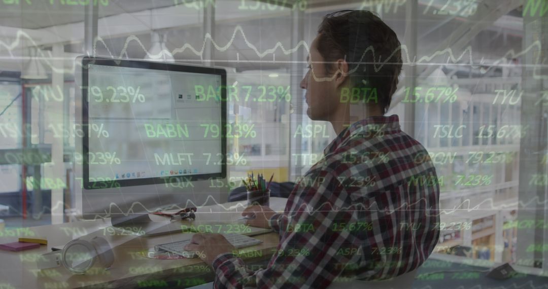 Businessman Analyzing Real-Time Stock Market Data on Computer