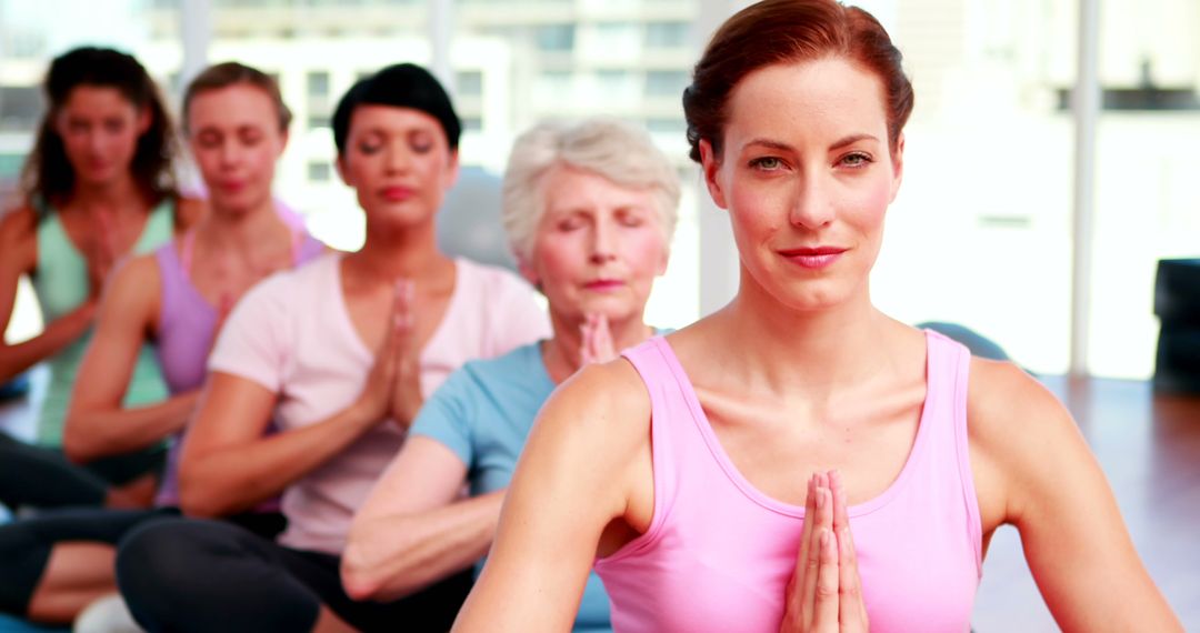 Women of Various Ages Practicing Yoga in Class - Free Images, Stock Photos and Pictures on Pikwizard.com