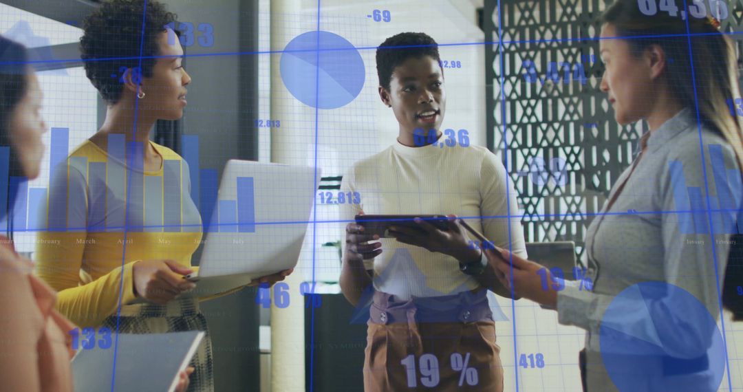 Diverse Team Collaborating on Financial Data Analytics in Modern Office