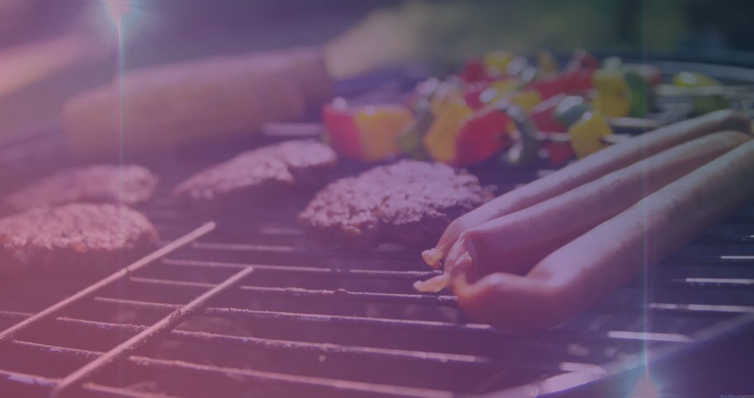 Barbecue Grill with Meat and Vegetables on Summer Day