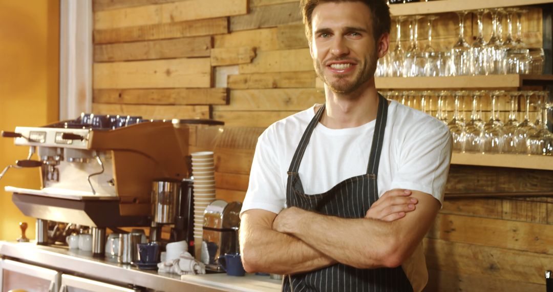 Smiling Barista Standing with Arms Crossed in Modern Coffee Shop - Free Images, Stock Photos and Pictures on Pikwizard.com