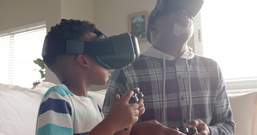 Grandfather and Grandson Using VR Headsets at Home - Free Images, Stock Photos and Pictures on Pikwizard.com