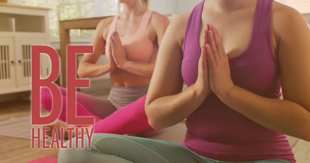 Diverse Females Meditating While Practicing Yoga at Home