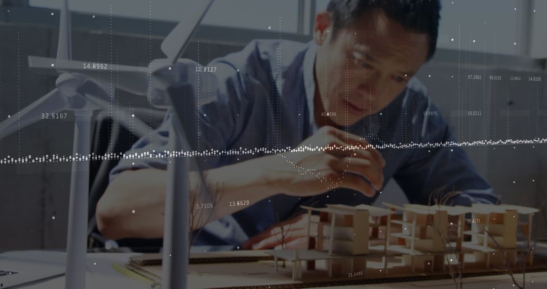 Engineer Working on Sustainable Building Model Concept