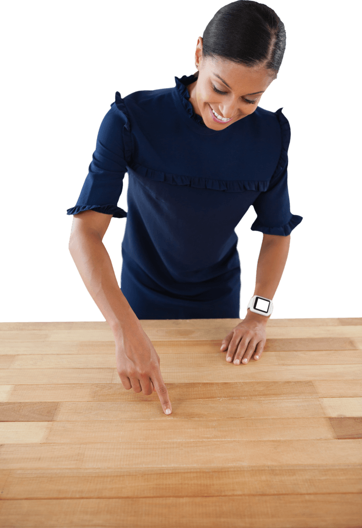 Smiling Businesswoman Touching Transparent Virtual Screen on Wood Table