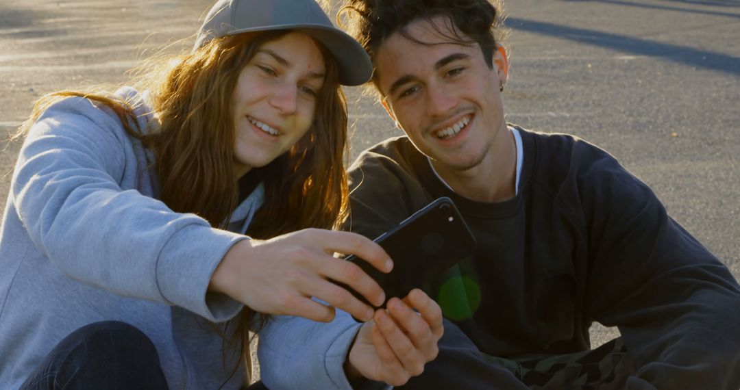 Happy Teen Friends Taking Selfie Outdoors in Casual Clothing - Free Images, Stock Photos and Pictures on Pikwizard.com