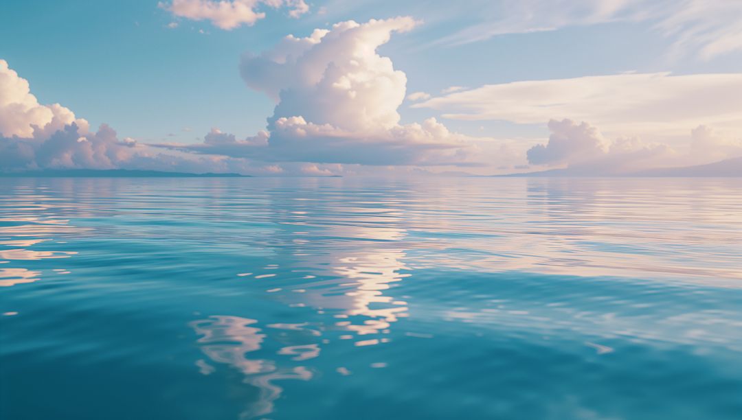 Calm Turquoise Ocean with Pastel Clouds Reflecting Bliss