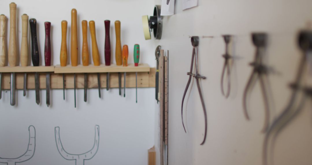 Image of tools hanging on walls in traditional carpentry workshop - Free Images, Stock Photos and Pictures on Pikwizard.com